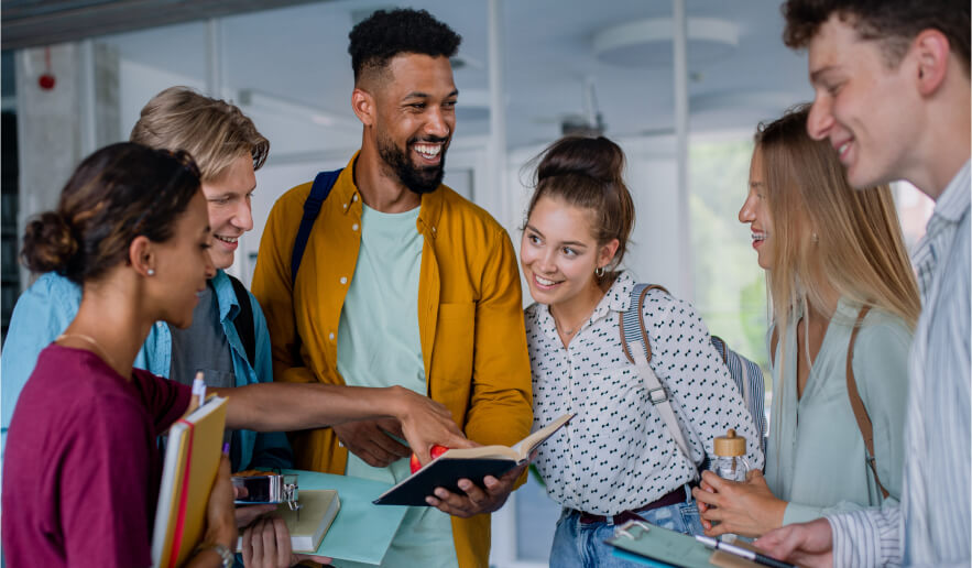 6 International students in a group talking