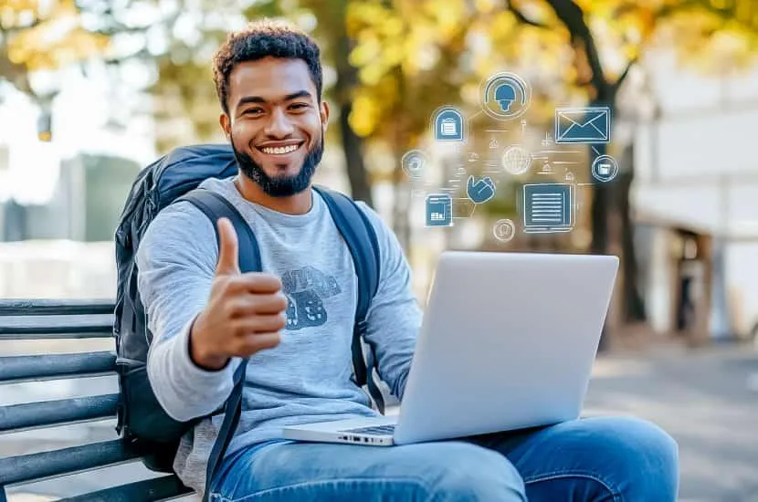International student on a bench gives a thumbs up