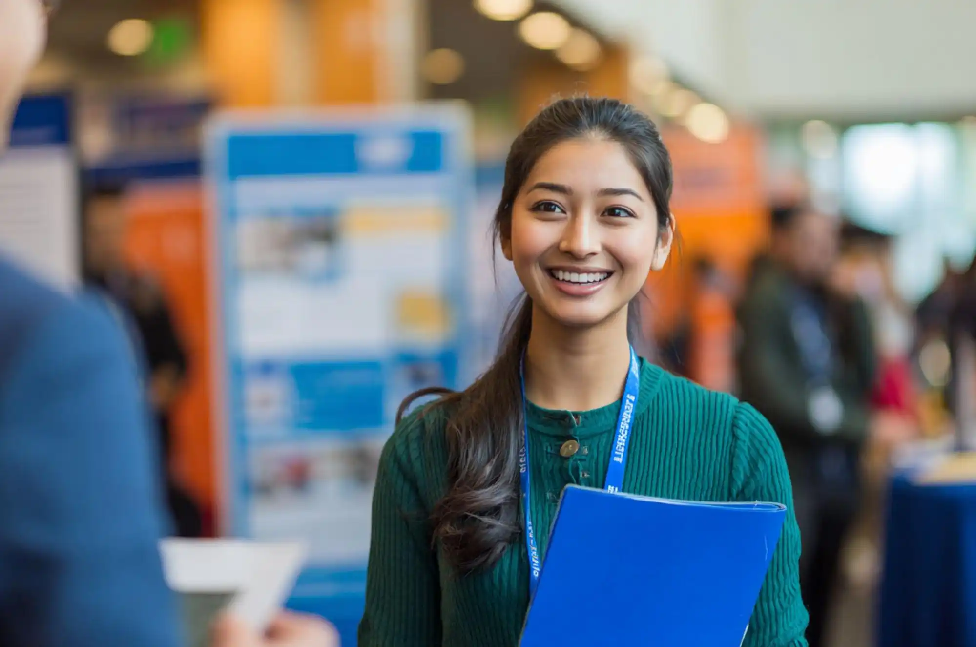 A Nepali student smiling with studying abroad