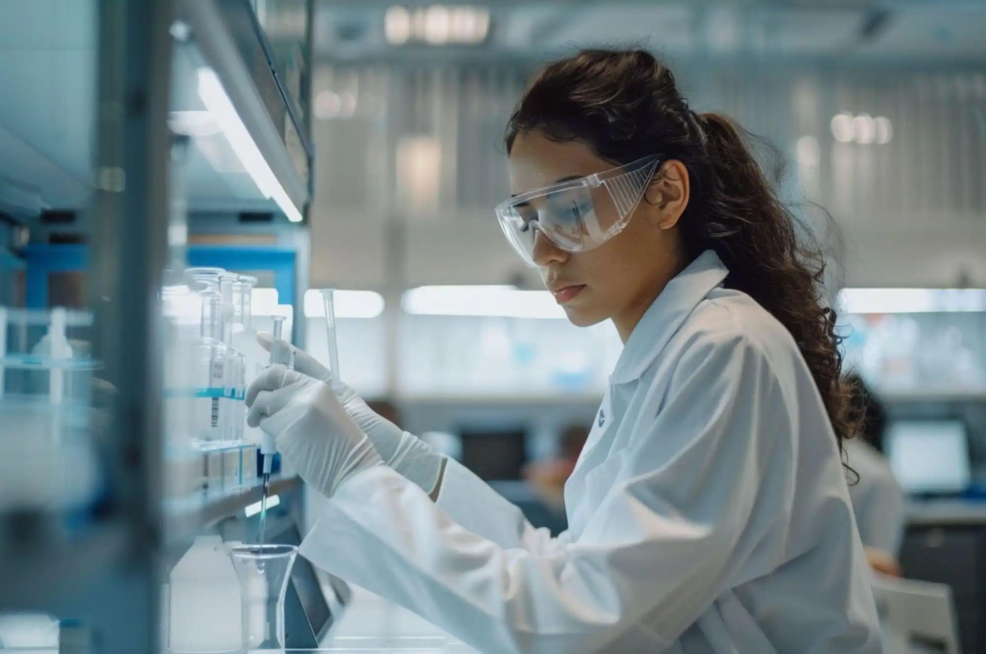 Student carrying out her experiments in a laboratory.