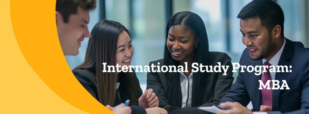 International MBA students reviewing material for class